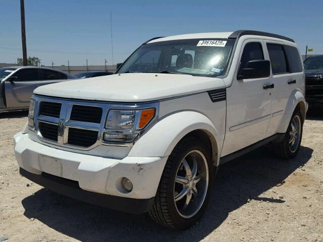 1D4PT4GK3BW599693 - 2011 DODGE NITRO HEAT WHITE photo 2