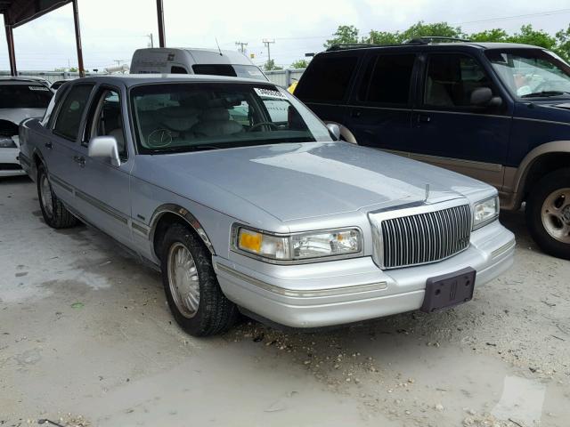 1LNLM83W0VY753659 - 1997 LINCOLN TOWN CAR C SILVER photo 1