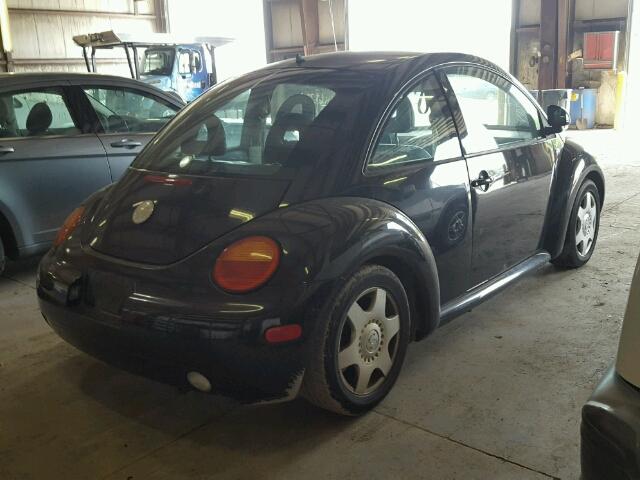 3VWCA21C6XM412443 - 1999 VOLKSWAGEN NEW BEETLE შავი ფოტო 4