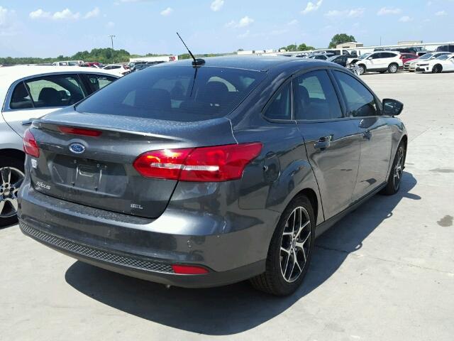 1FADP3H26HL204533 - 2017 FORD FOCUS GRAY photo 4