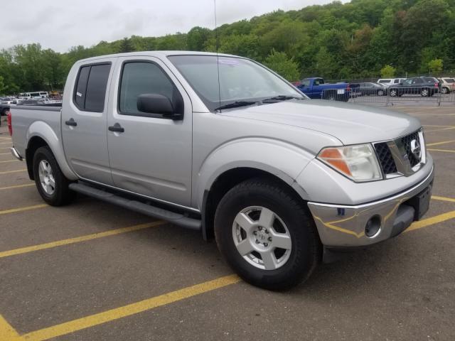 1N6AD07W45C432953 - 2005 NISSAN FRONTIER C SILVER photo 1