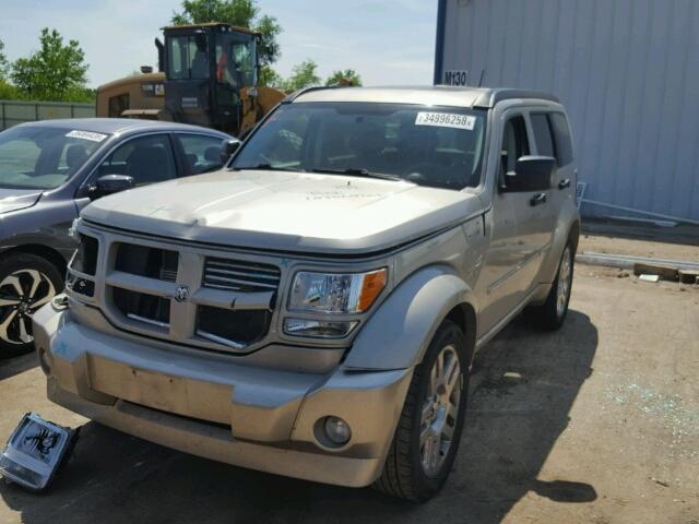 1D4PU5GX7AW124335 - 2010 DODGE NITRO SXT GOLD photo 2