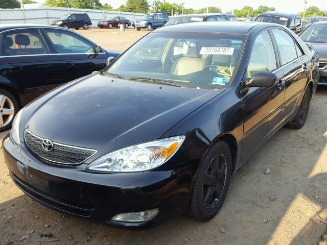 4T1BF30K62U002675 - 2002 TOYOTA CAMRY LE BLACK photo 2