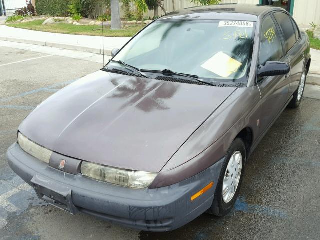 1G8ZH5280XZ225647 - 1999 SATURN SL1 BROWN photo 2