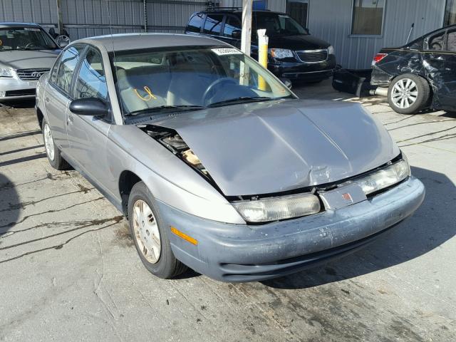 1G8ZH528XXZ260499 - 1999 SATURN SL1 GRAY photo 1