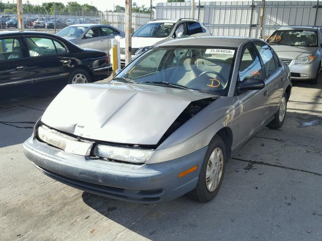 1G8ZH528XXZ260499 - 1999 SATURN SL1 GRAY photo 2