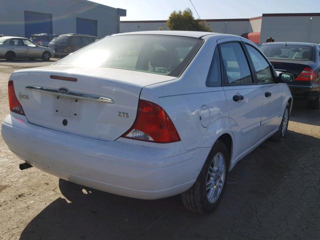 1FAFP3839YW297354 - 2000 FORD FOCUS ZTS WHITE photo 4