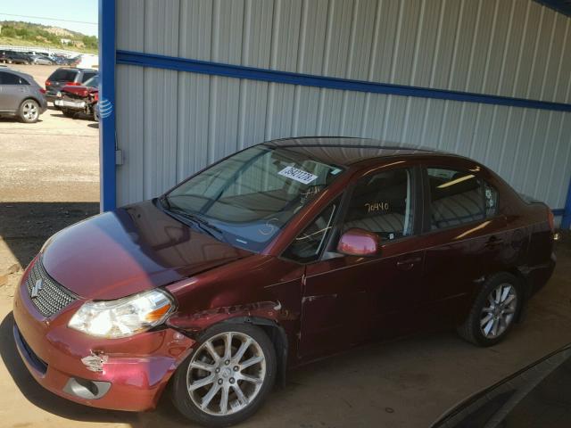 JS2YC5A22B6302838 - 2011 SUZUKI SX4 LE MAROON photo 9