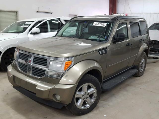 1D8GU58K77W555753 - 2007 DODGE NITRO SLT GOLD photo 2