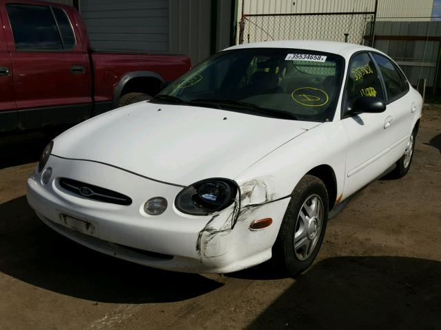 1FAFP52U4XG256099 - 1999 FORD TAURUS LX WHITE photo 2