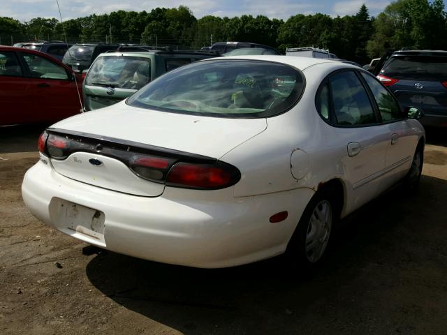 1FAFP52U4XG256099 - 1999 FORD TAURUS LX WHITE photo 4