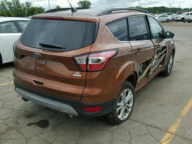 1FMCU0GD4HUD07987 - 2017 FORD ESCAPE SE BROWN photo 4