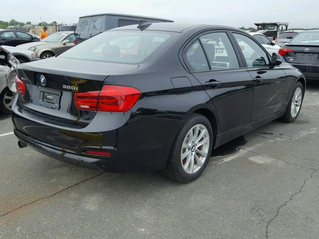 WBA8E5G50GNU21519 - 2016 BMW 320 XI BLACK photo 4