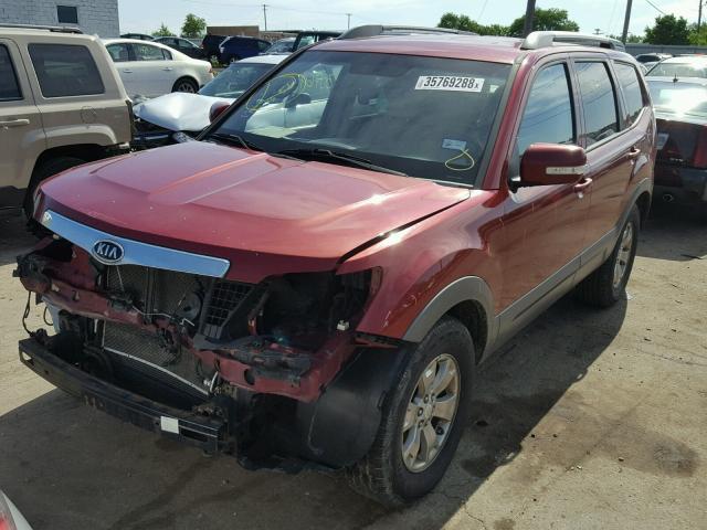 KNDJJ741595020385 - 2009 KIA BORREGO LX RED photo 2