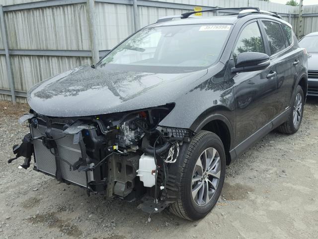 JTMRJREV1JD178250 - 2018 TOYOTA RAV4 HV LE BLACK photo 2