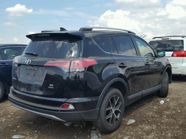 2T3JFREV2HW644540 - 2017 TOYOTA RAV4 SE BLACK photo 4