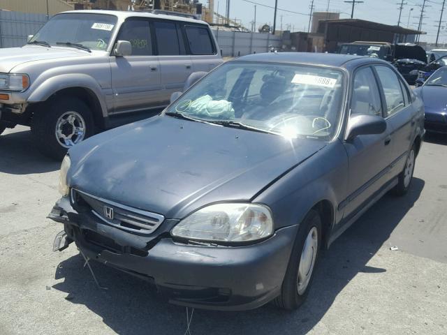 2HGEJ6619XH528908 - 1999 HONDA CIVIC BASE GREEN photo 2