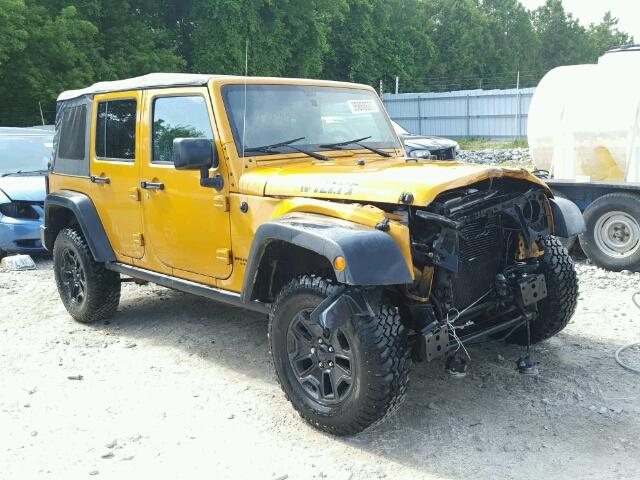 1C4BJWDG8EL242878 - 2014 JEEP WRANGLER U ORANGE photo 1