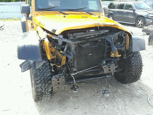 1C4BJWDG8EL242878 - 2014 JEEP WRANGLER U ORANGE photo 9