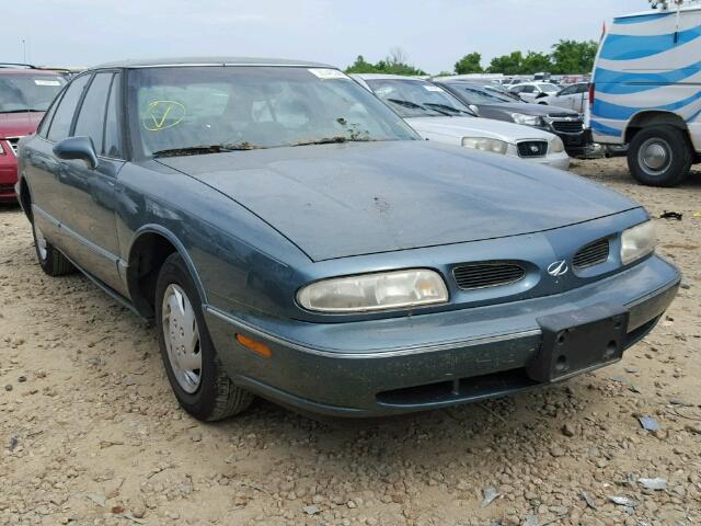 1G3HN52K7W4832176 - 1998 OLDSMOBILE 88 BASE GREEN photo 1