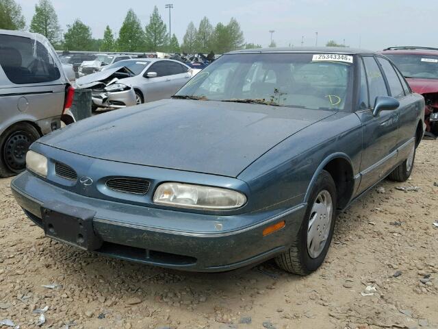 1G3HN52K7W4832176 - 1998 OLDSMOBILE 88 BASE GREEN photo 2