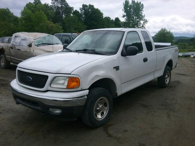 2FTRX18W44CA30571 - 2004 FORD F-150 HERI WHITE photo 2