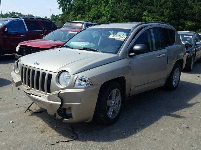 1J4NF4FB8AD557473 - 2010 JEEP COMPASS SP GOLD photo 2