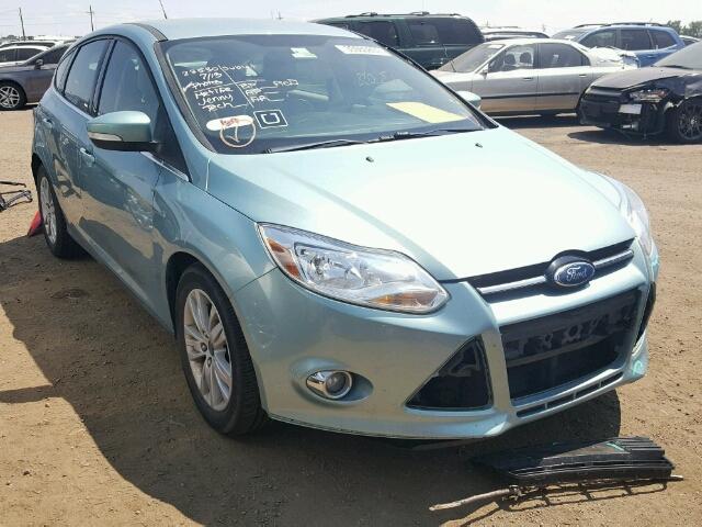 1FAHP3M2XCL317305 - 2012 FORD FOCUS SEL BLUE photo 1