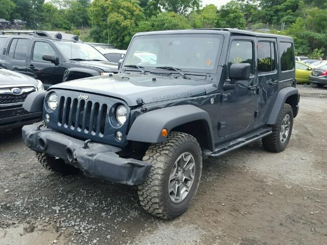 1C4BJWFG2GL220388 - 2016 JEEP WRANGLER U GRAY photo 2