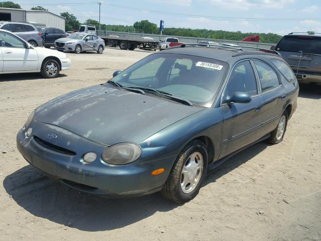 1FALP57U3VG300070 - 1997 FORD TAURUS GL TEAL photo 2