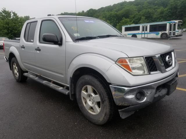 1N6AD07W65C445672 - 2005 NISSAN FRONTIER C SILVER photo 1