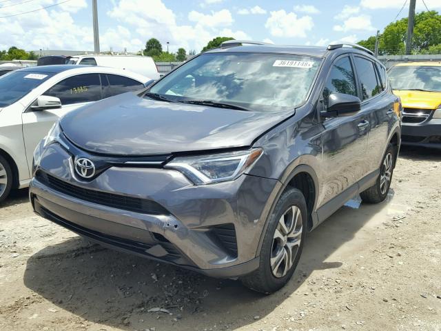 2T3ZFREV5GW270703 - 2016 TOYOTA RAV4 LE GRAY photo 2