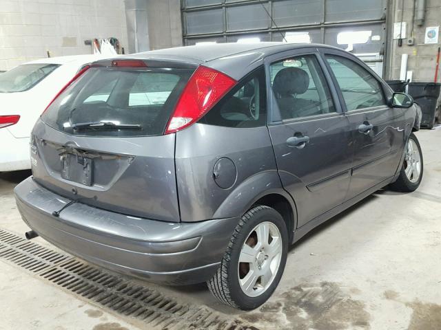 1FAHP37NX7W182594 - 2007 FORD FOCUS ZX5 GRAY photo 4