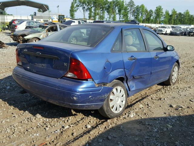 1FAFP34384W152614 - 2004 FORD FOCUS SE C BLUE photo 4