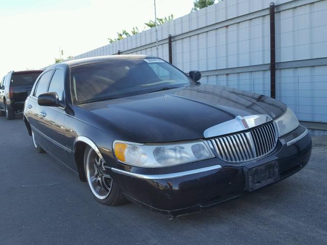 1LNHM82W21Y679971 - 2001 LINCOLN TOWN CAR S BLACK photo 1