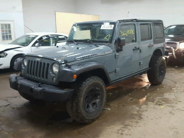 1C4BJWFG5EL184550 - 2014 JEEP WRANGLER U GRAY photo 2