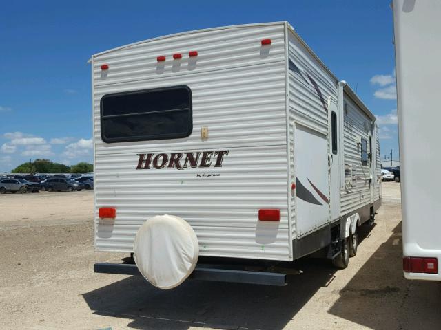 4YDT31R28B7200808 - 2011 KEYSTONE HORNET TWO TONE photo 4