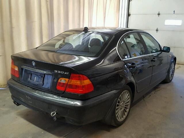 WBAEW53404PN32620 - 2004 BMW 330 XI BLACK photo 4