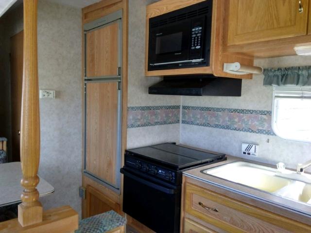 4YDF2552517300117 - 2001 KEYSTONE HORNET WHITE photo 7