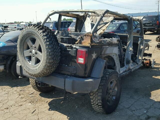 1J4HA6H10BL564680 - 2011 JEEP WRANGLER U BLACK photo 4