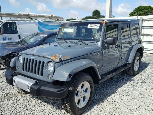 1C4BJWEG2EL179825 - 2014 JEEP WRANGLER U GRAY photo 2