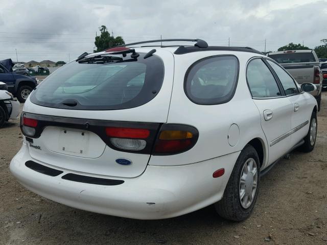 1FALP57U2VA323312 - 1997 FORD TAURUS GL WHITE photo 4