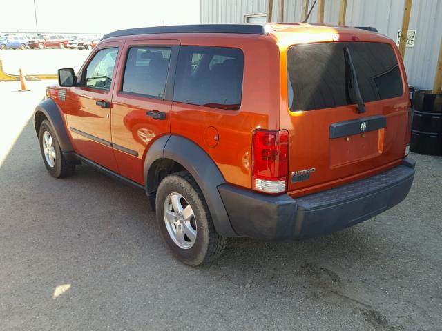 1D8GT28KX7W597125 - 2007 DODGE NITRO SXT ORANGE photo 3