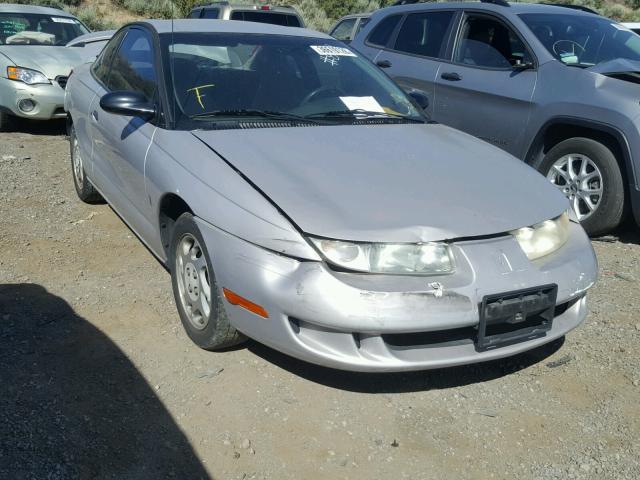 1G8ZP1287YZ184608 - 2000 SATURN SC1 SILVER photo 1