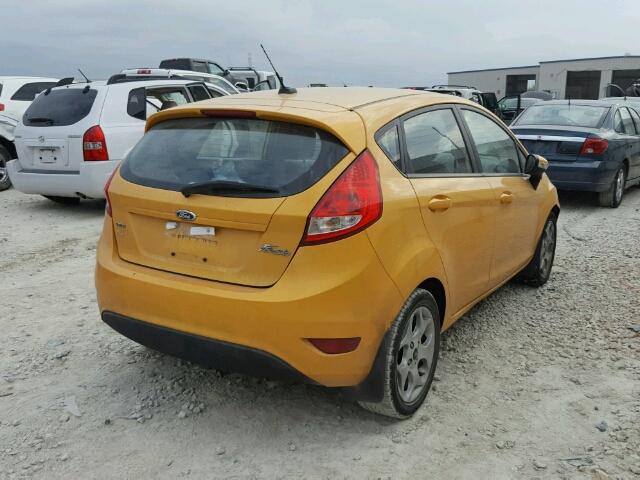 3FADP4FJ1BM144439 - 2011 FORD FIESTA YELLOW photo 4