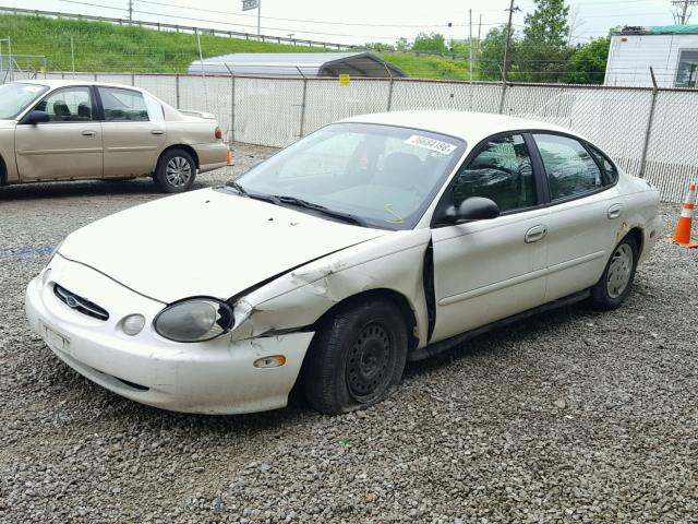 1FAFP52U5XG194101 - 1999 FORD TAURUS LX WHITE photo 2