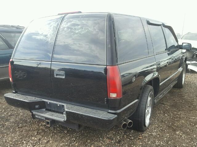 1GNEC13R8YR135433 - 2000 CHEVROLET TAHOE BLACK photo 4