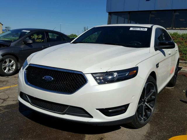 1FAHP2KT7GG100721 - 2016 FORD TAURUS SHO WHITE photo 2