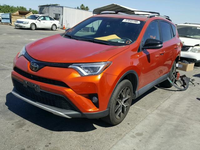 2T3NFREV9GW309470 - 2016 TOYOTA RAV4 SE ORANGE photo 2