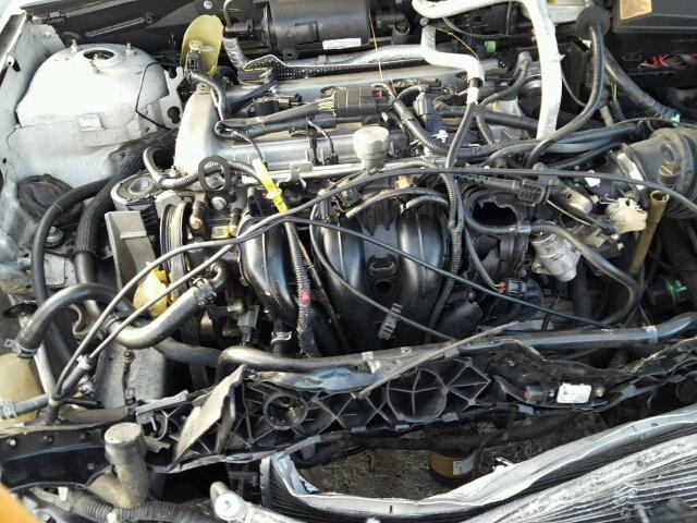 1FAFP33Z94W182176 - 2004 FORD FOCUS LX SILVER photo 7